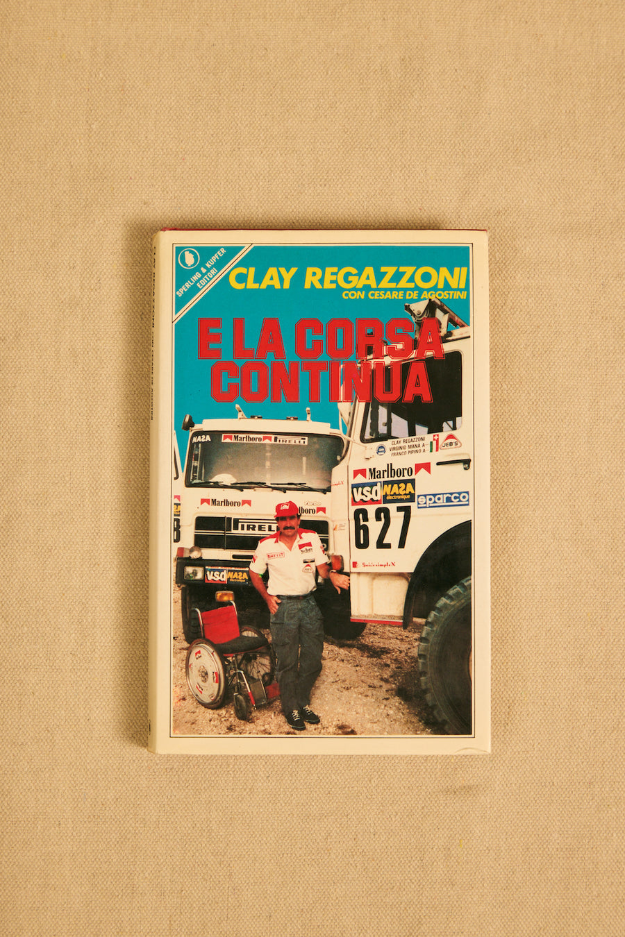 ARCHIVIO - E La Corsa Continua By Clay Regazzoni